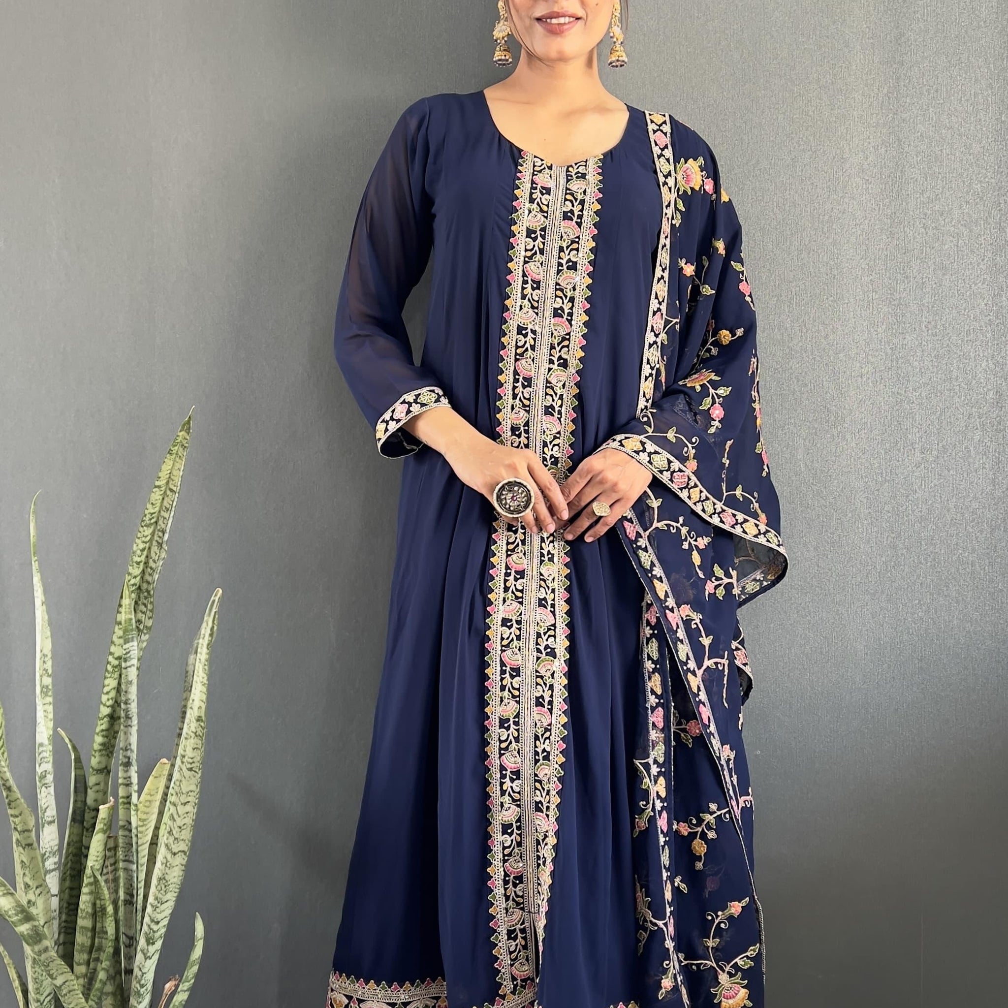 Stunning Vichitra Anarkali Set featuring exquisite embroidery work.
