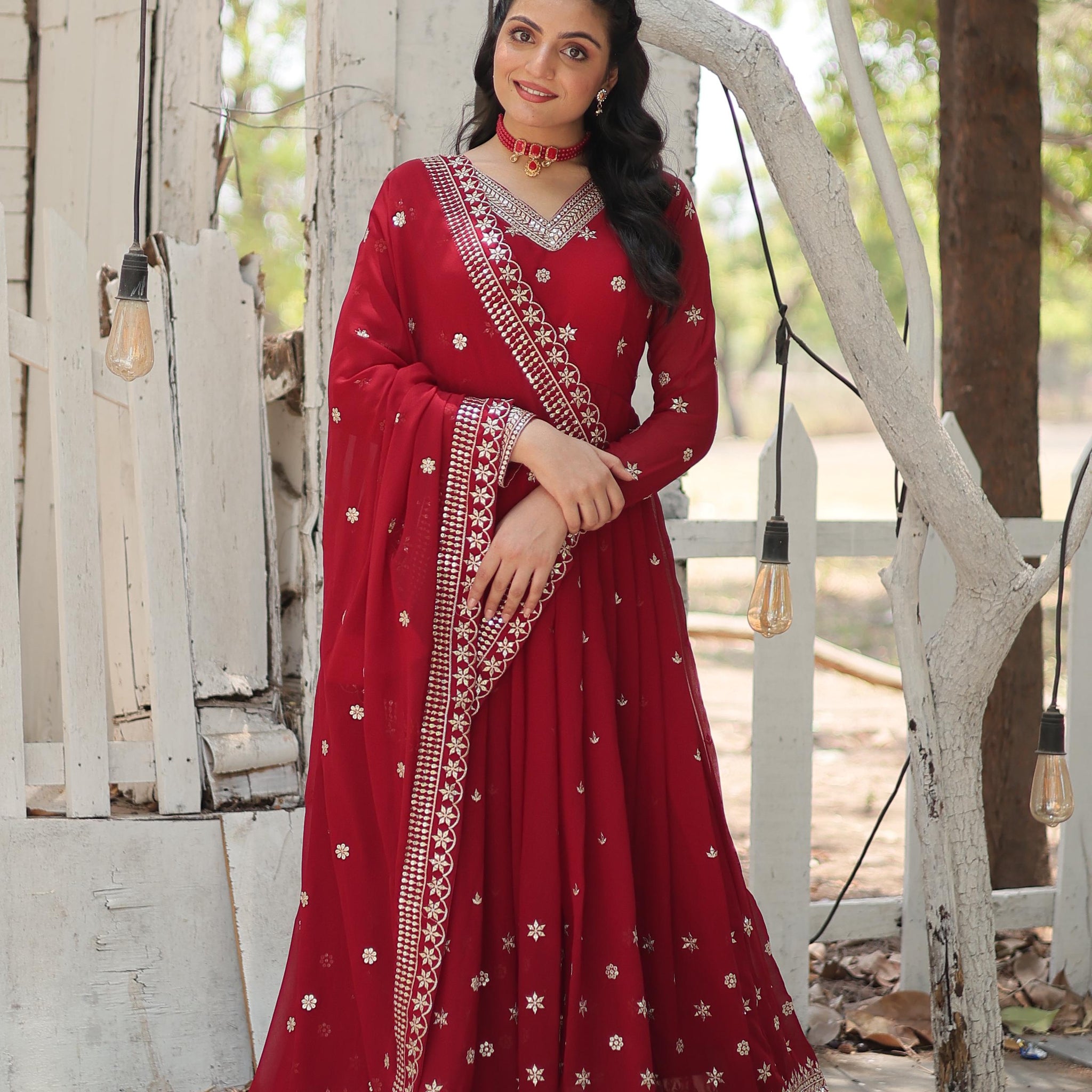 Maroon Color Faux Blooming Rich Sequence Embroidered Gown