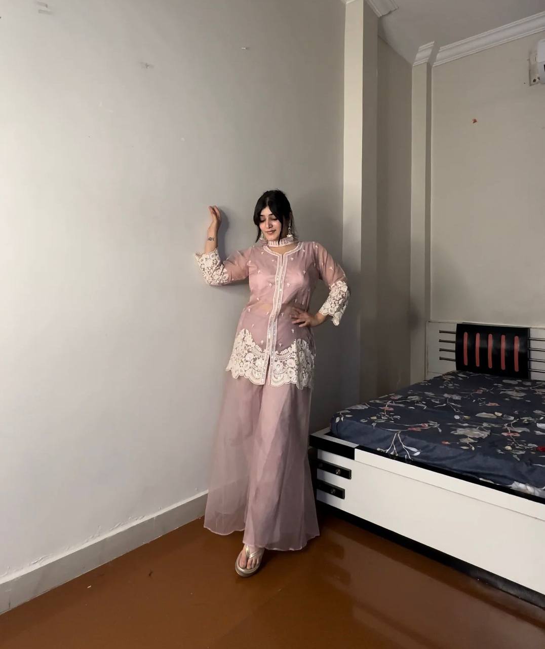 this Indo-Western outfit blends elegance with modern style.